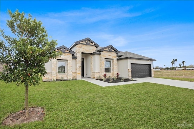 view of front facade featuring a garage, stone siding, concrete driveway, and a front yard