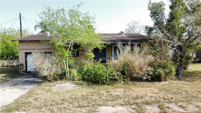 view of front of home with brick siding