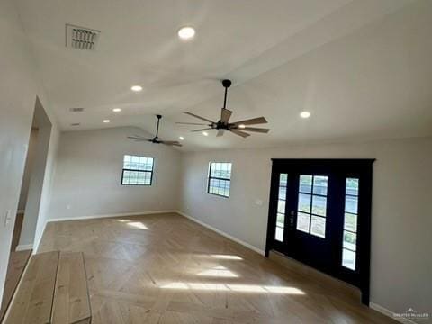 foyer with light parquet floors and ceiling fan