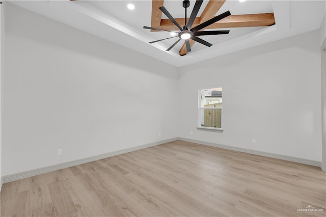 812 Spring Dr, Alton, TX 78573 - unfurnished room with a tray ceiling, light wood finished floors, baseboards, and recessed lighting