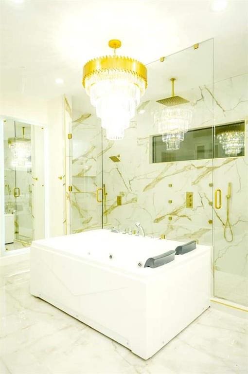 bathroom featuring a shower with shower door and tile walls