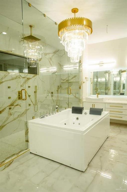 bathroom featuring vanity, tile walls, independent shower and bath, and a chandelier