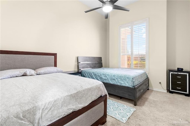 4004 Persimmon Dr, Palmhurst, TX 78573 - bedroom featuring light colored carpet, a ceiling fan, and baseboards