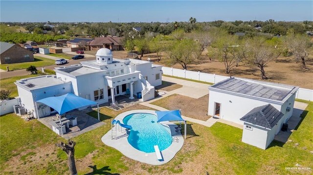 4004 Persimmon Dr, Palmhurst, TX 78573 - view from above of property featuring a pool area