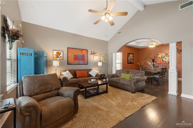 506 Orchard Ct, Weslaco, TX 78596 - living area featuring a ceiling fan, arched walkways, dark wood-style flooring, high vaulted ceiling, and beamed ceiling