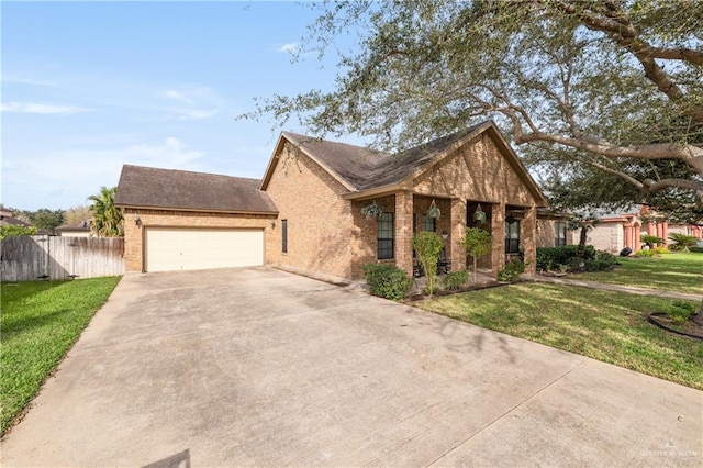 view of front of property with a garage and a front lawn