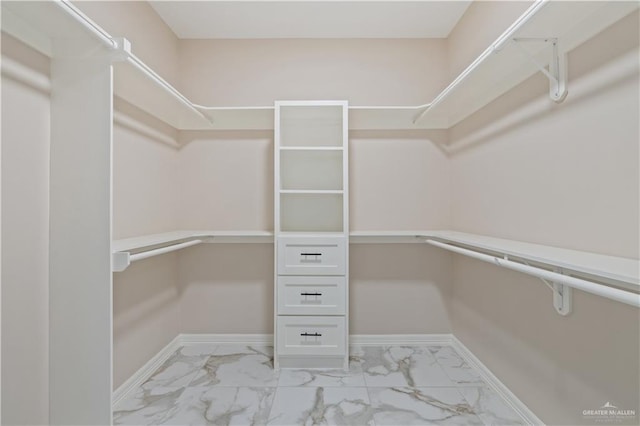727 N Milam St, San Benito, TX 78586 - walk in closet featuring marble finish flooring