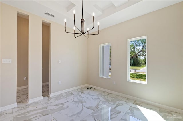 727 N Milam St, San Benito, TX 78586 - spare room with light marble finish flooring, a chandelier, and beam ceiling