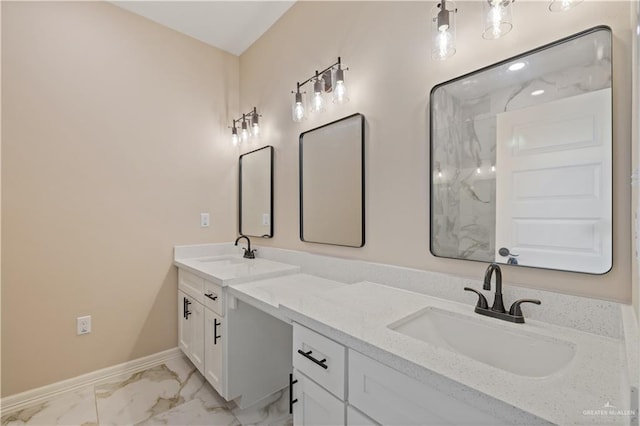 727 N Milam St, San Benito, TX 78586 - full bathroom with marble look tiles, double vanity, baseboards, and a marble finish shower