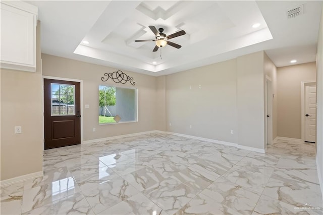 727 N Milam St, San Benito, TX 78586 - entryway with a raised ceiling, baseboards, a ceiling fan, recessed lighting, and light marble finish flooring
