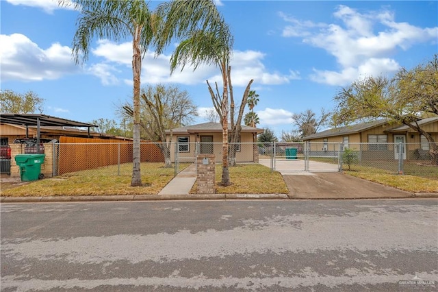 view of front facade with a fenced front yard, a gate, and a front lawn