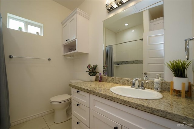 bathroom with tile patterned flooring, vanity, a shower with curtain, and toilet