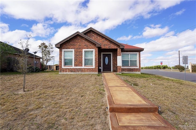 view of front of home with a front yard