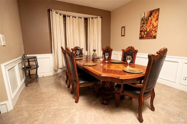 809 N Trosper Rd, Alton, TX 78573 - dining area featuring a decorative wall and wainscoting