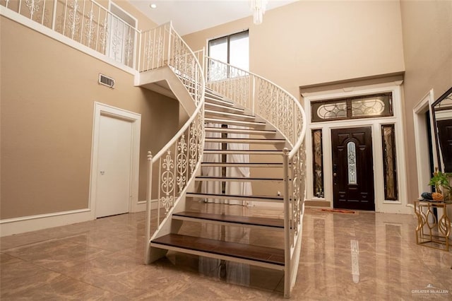 809 N Trosper Rd, Alton, TX 78573 - staircase featuring a towering ceiling and marble tiled flooring
