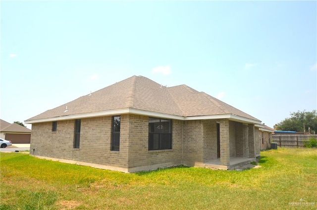 3107 E Laurel St, Hidalgo, TX 78557 - view of side of property featuring brick siding