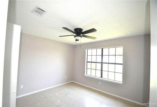 3107 E Laurel St, Hidalgo, TX 78557 - empty room featuring baseboards and ceiling fan