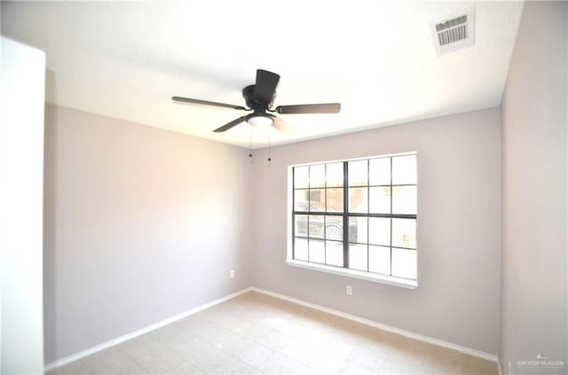 3107 E Laurel St, Hidalgo, TX 78557 - unfurnished room with baseboards and ceiling fan