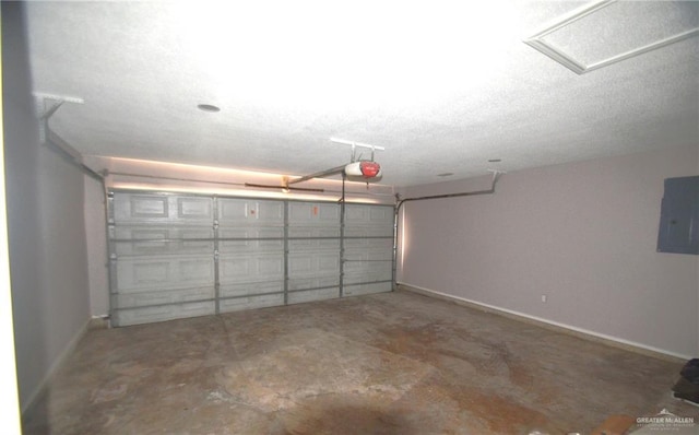 3107 E Laurel St, Hidalgo, TX 78557 - garage featuring electric panel, a garage door opener, and baseboards