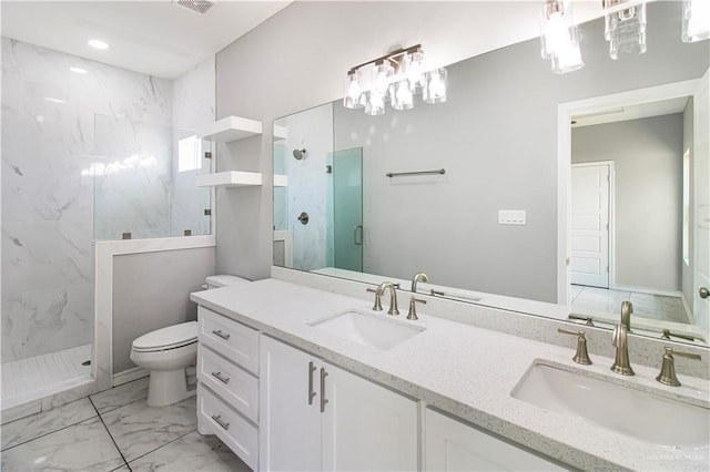 2025 Trinity St, Donna, TX 78537 - bathroom featuring marble finish floors, a marble finish shower, toilet, and double vanity