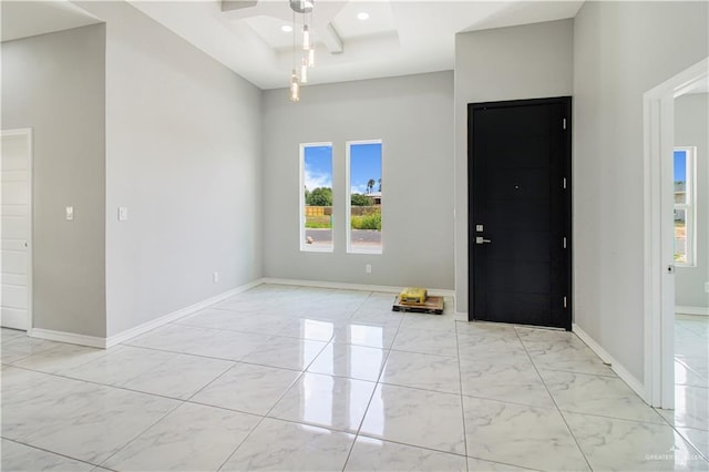 2025 Trinity St, Donna, TX 78537 - spare room featuring light marble finish floors, a ceiling fan, baseboards, recessed lighting, and a high ceiling
