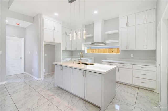 2025 Trinity St, Donna, TX 78537 - kitchen featuring light marble finish flooring, a sink, white cabinetry, and recessed lighting
