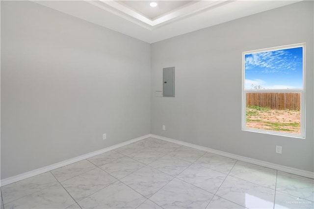2025 Trinity St, Donna, TX 78537 - unfurnished room with light marble finish floors, electric panel, and baseboards