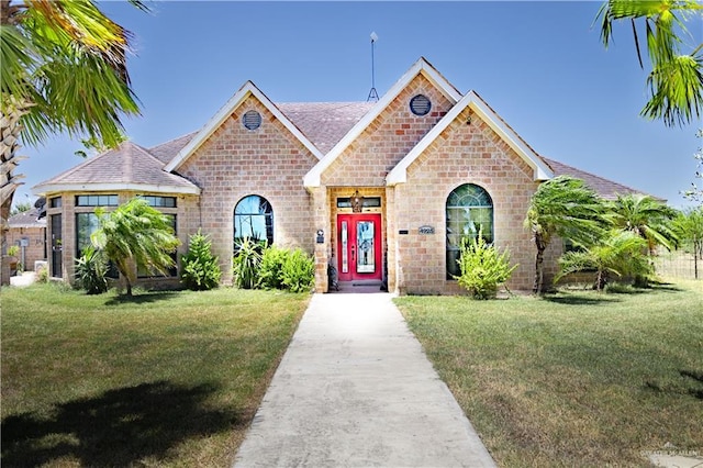 view of front of property with a front lawn