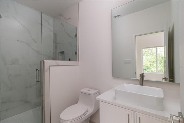 2711 Harmony St, Mission, TX 78574 - full bath with a marble finish shower, vanity, toilet, and visible vents
