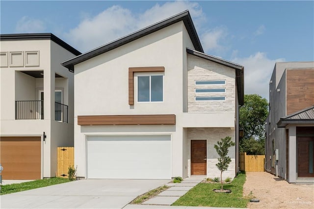 2711 Harmony St, Mission, TX 78574 - contemporary home featuring a garage, stucco siding, driveway, and fence