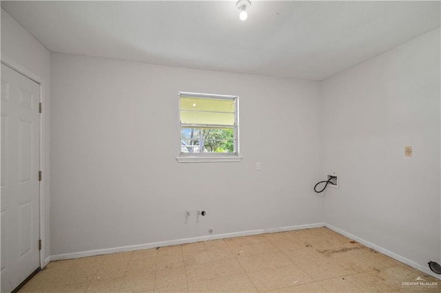 206 E Ricky Crossland Ave, Elsa, TX 78543 - empty room with light flooring and baseboards