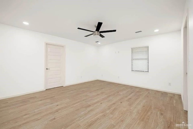 empty room with a ceiling fan, visible vents, recessed lighting, and light wood finished floors