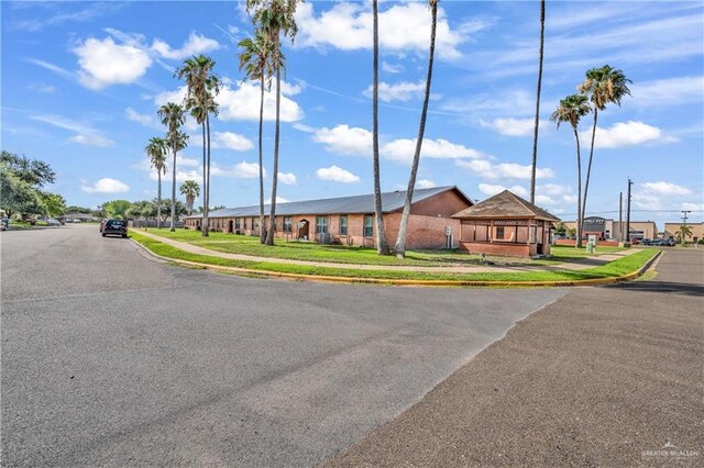 1700 E 23rd St Unit 15, Mission, TX 78574 - view of asphalt road with sidewalks and curbs