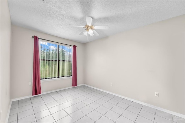 1700 E 23rd St Unit 15, Mission, TX 78574 - spare room with a ceiling fan, a textured ceiling, and light tile patterned floors