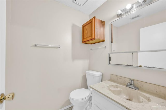 1700 E 23rd St Unit 15, Mission, TX 78574 - bathroom featuring toilet and vanity