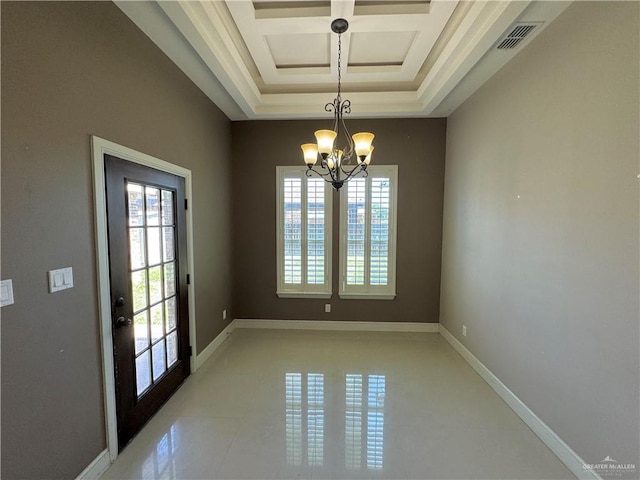 unfurnished dining area with an inviting chandelier and coffered ceiling