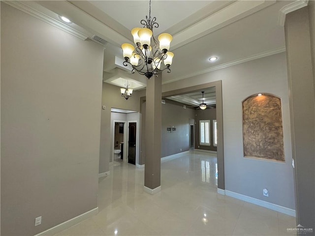 interior space featuring ceiling fan with notable chandelier, light tile patterned flooring, and ornamental molding