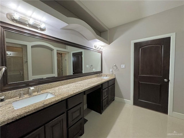 bathroom featuring tile patterned floors and vanity