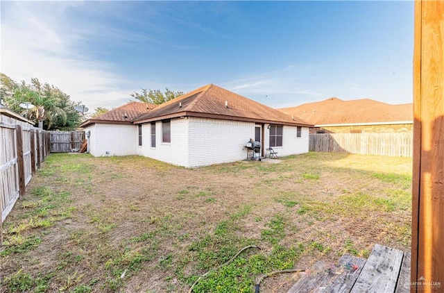 2121 Kingsborough Ave, Mcallen, TX 78504 - back of house featuring brick siding