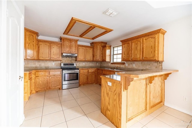 2121 Kingsborough Ave, Mcallen, TX 78504 - kitchen with stainless steel electric stove, under cabinet range hood, a peninsula, a kitchen bar, and light tile patterned flooring