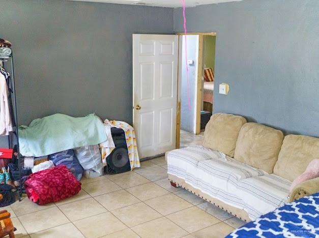 4011 Pepe Dr, Mission, TX 78574 - bedroom featuring tile patterned floors