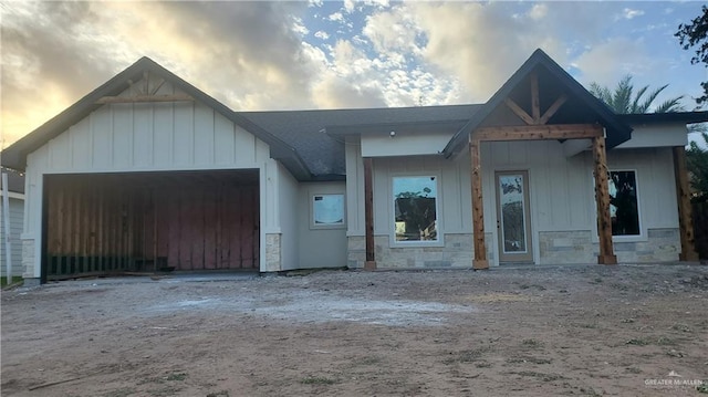 view of front of property with a garage