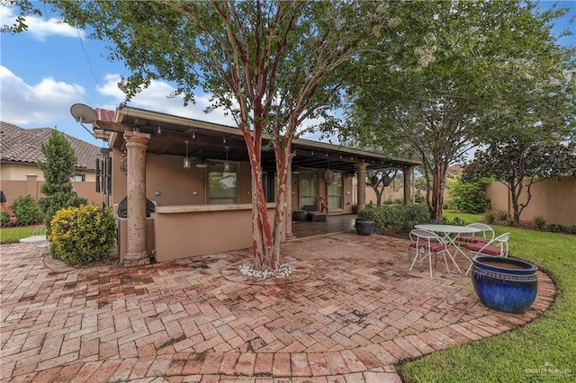 view of patio / terrace with ceiling fan