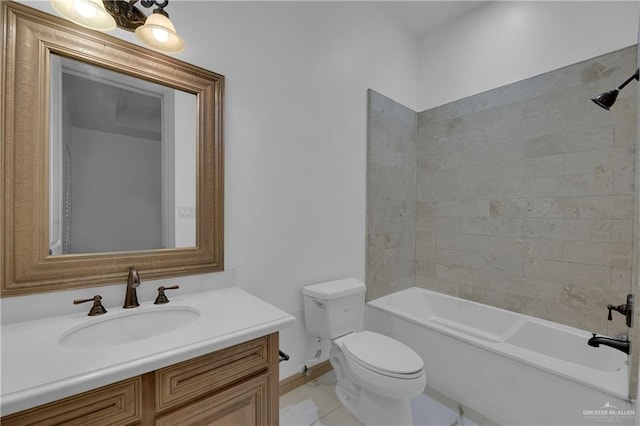 full bathroom featuring tile patterned flooring, vanity, toilet, and tiled shower / bath combo