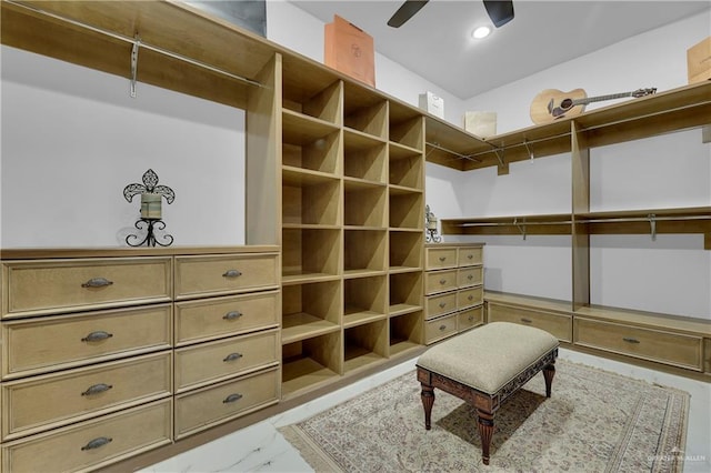 spacious closet featuring ceiling fan