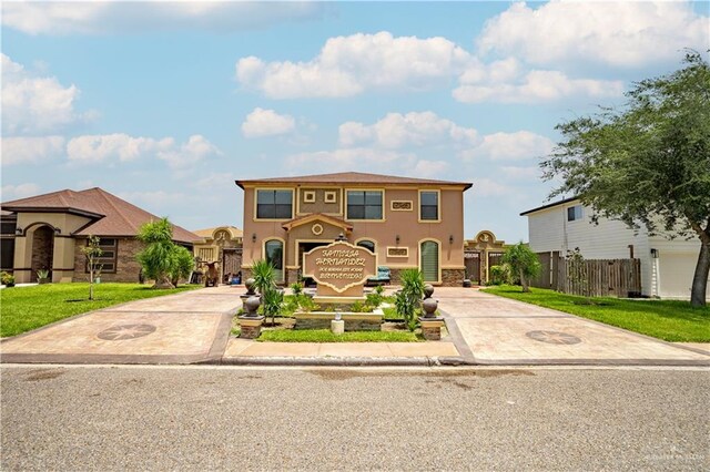 view of front of home with a front lawn