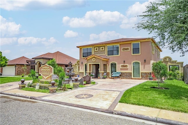 view of front of home with a front yard