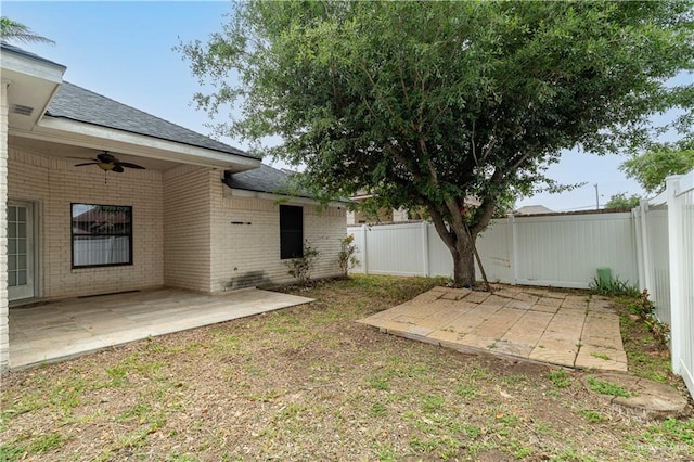 3512 W Gardenia Ave, Mcallen, TX 78501 - view of yard with a ceiling fan, a patio, and a fenced backyard
