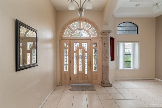 3512 W Gardenia Ave, Mcallen, TX 78501 - entrance foyer featuring ornate columns, light tile patterned floors, and baseboards