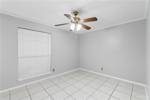 tiled spare room with ceiling fan and crown molding